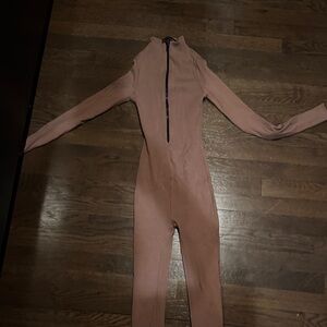 Naked Wardrobe Pink Jumpsuit with Front Zipper